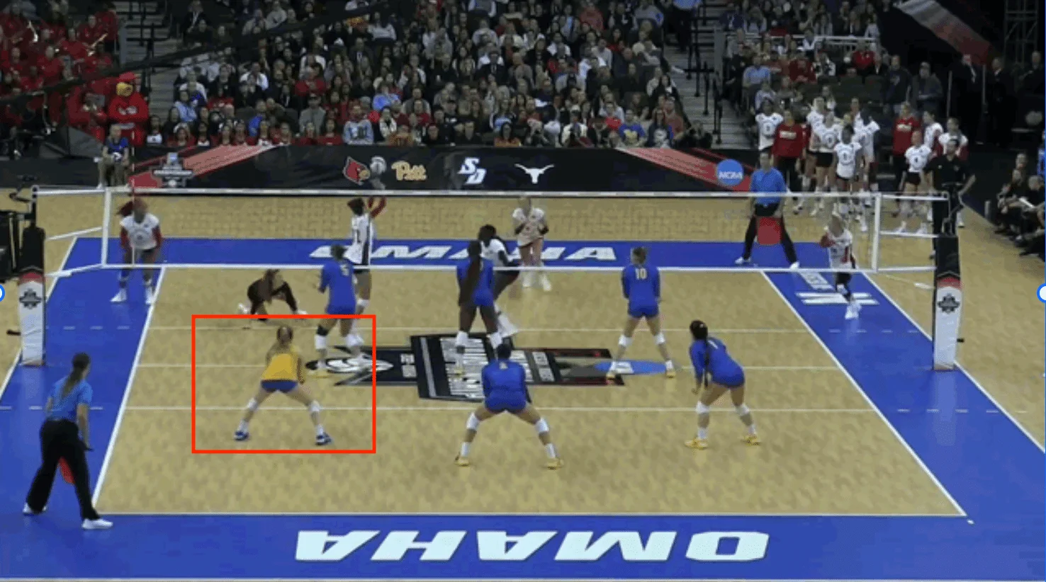 the libero is playing in the left back position in a volleyball game